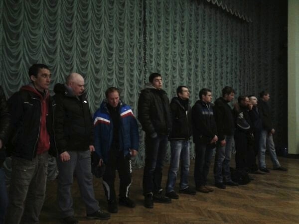 Photo by Oleksandr Arhat‏@olarhat. Captured titushkas present themselves in the Maidan Headquarters. ~