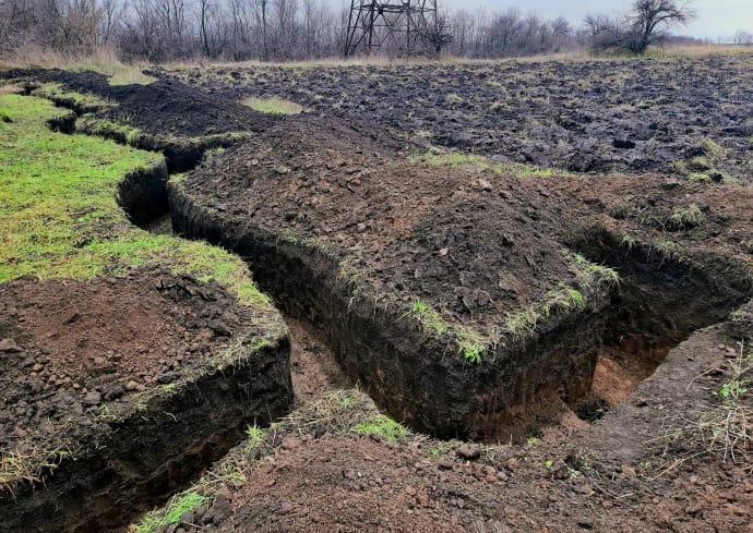 Anton Filatov: We are standing near the trench. Something rumbles nearby. The guards report that large-sized equipment is moving across the field. A man comes out of it and walks directly towards us. A man approaches and gestures that he wants to tell us something... A few hours later, this man finished ploughing the field close to the trench. 