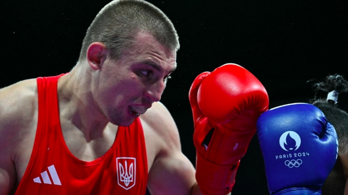 Ukrainian boxer Oleksandr Khyzhniak secures at least silver at 2024 Olympics