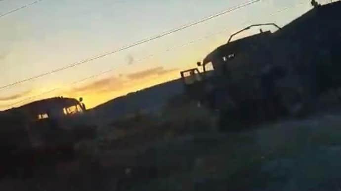 Russian partisan blows up 2 trucks carrying Russian occupiers in Henichesk, Kherson Oblast