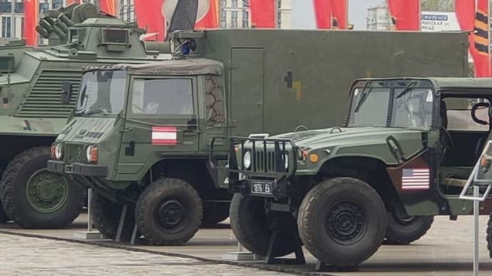 All-terrain vehicle with flag of neutral Austria shown at NATO trophy vehicle exhibition in Moscow – photo