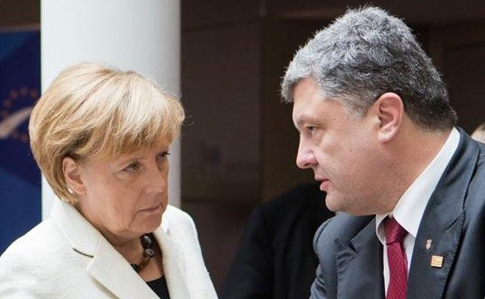 Порошенко связал победу Меркель с восстановлением целостности Украины