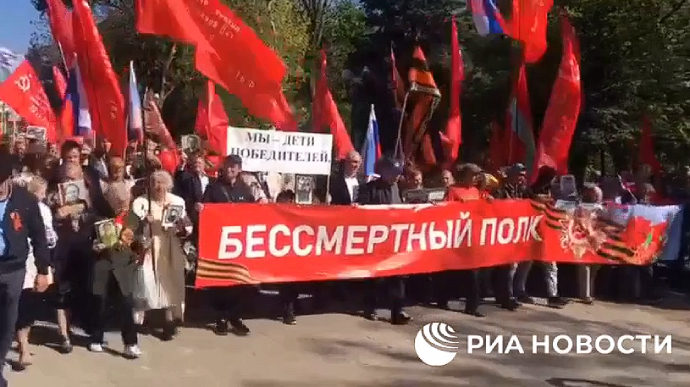 Russians hold parades with Soviet flags in occupied Ukrainian cities