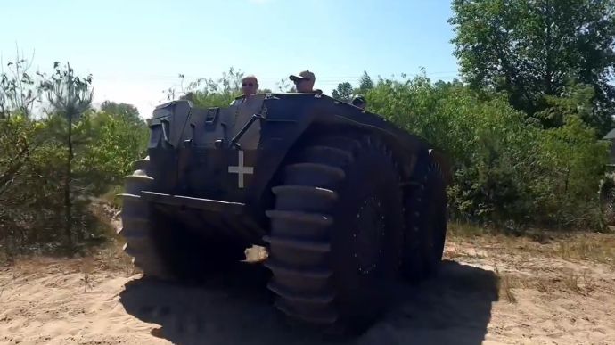 Ukraine's Defence Minister test-drives Ukrainian-made all-terrain vehicle and promises to order more for country's army