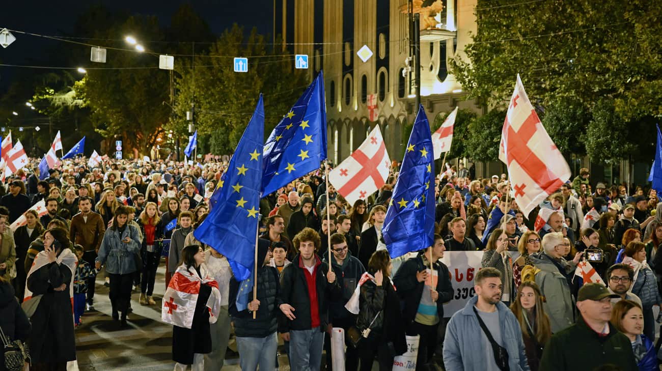 Protests erupt in Georgia after government freezes EU accession process