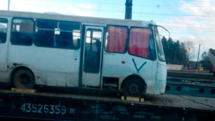 Route bus stolen in Ukraine spotted in Minsk as part of a Russian military echelon