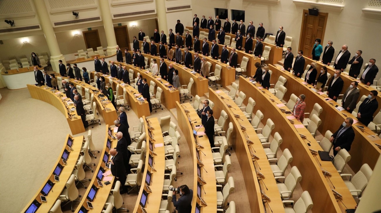 Lawmakers fight in Georgian parliament during consideration of ...