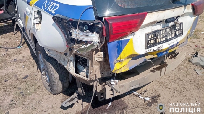 Russians strike police car in Mykolaiv Oblast, injuring officers – photos