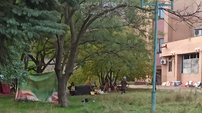 People in occupied Mariupol still live in tents and cook over bonfires