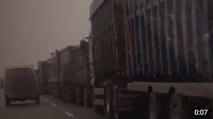 15-km queue of trucks carrying grain stolen by the invaders forming at Russian Federation border