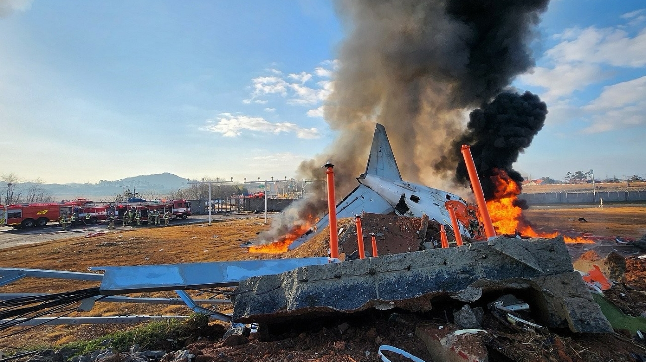 Passenger plane carrying 181 people crashes in South Korea – video