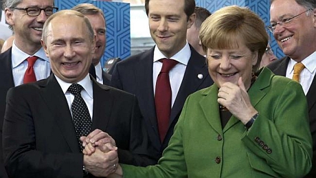 Путін і Меркель посміялися