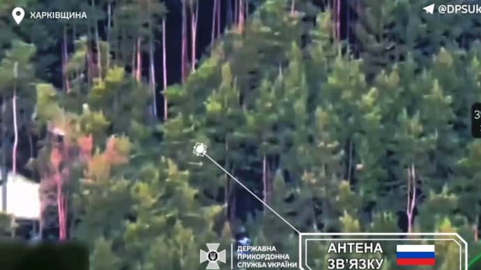 Ukrainian border guards destroy Russian communication antenna disguised in forest – video