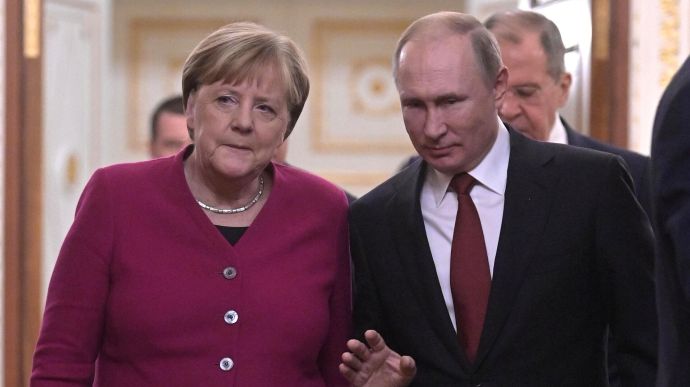 Putin disappointed by Merkel's words about Minsk agreements