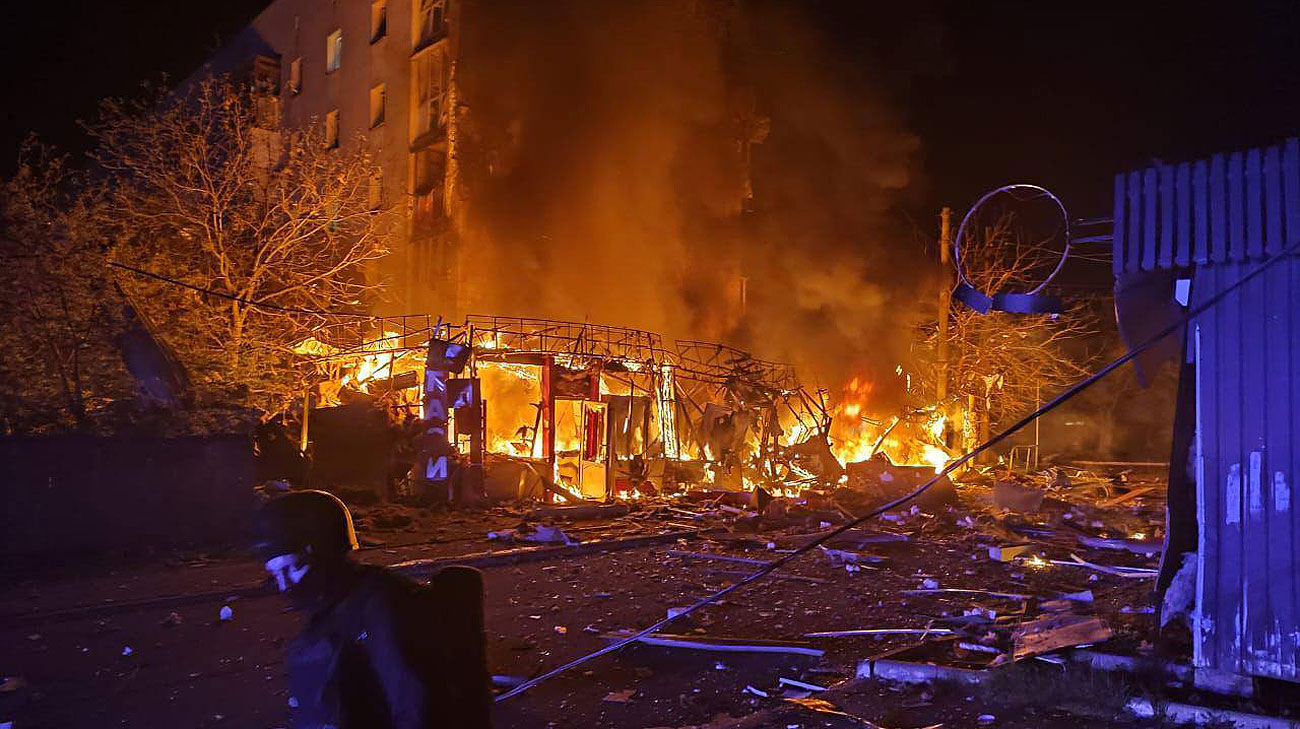High-rise buildings, warehouses and cars damaged and fires rage after Russian attack on Kyiv Oblast – photos