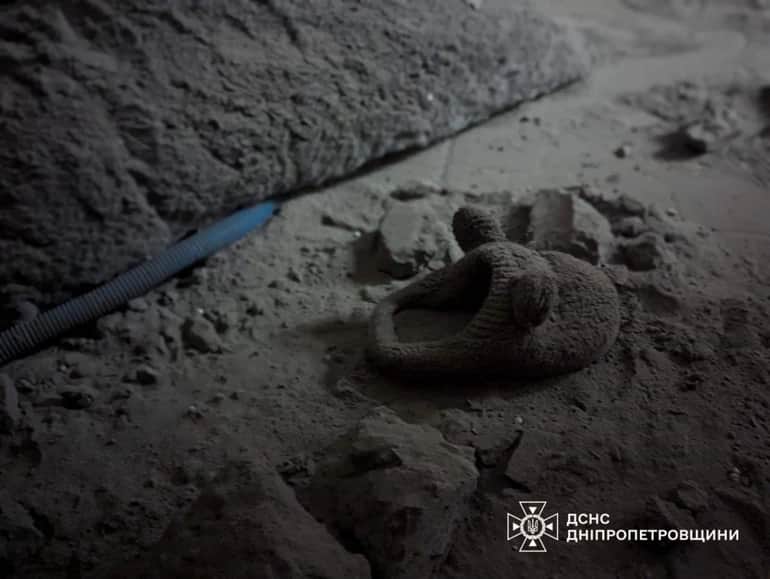 A child's shoe in the destroyed house.