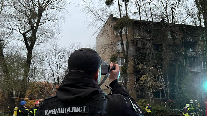 Russian missiles hit residential buildings in central Kyiv, killing at least 1 civilian