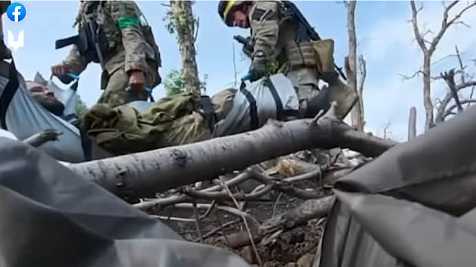 Special operations forces soldiers rescue wounded infantry near Bakhmut