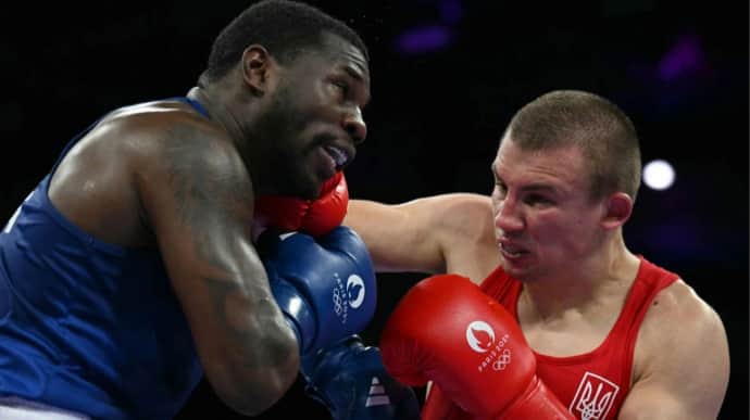 Ukrainian boxer Khyzhniak defeats Brazilian Pereira and secures Olympic medal