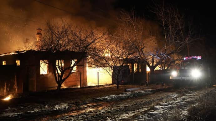 Two houses ablaze in Kharkiv Oblast due to Russian attack