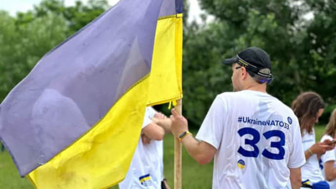 Runners to deliver flag from Bakhmut to NATO summit in Vilnius