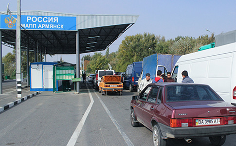 Запрет торговли с Крымом вступит в силу через месяц - Яценюк